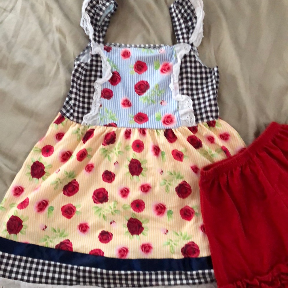 dress with red ruffle shorts